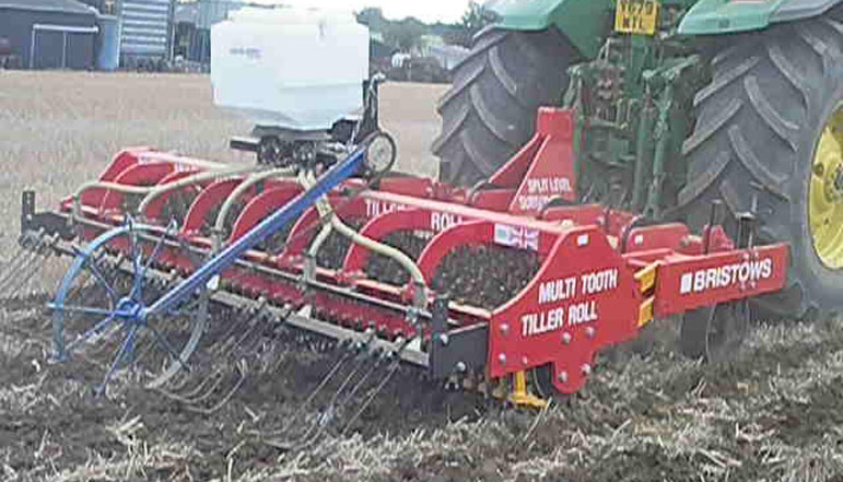Dean wesley compares his subsoiler with DD rings to the Bristow's tiller roll
